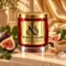 MAISON NOOR Brown Sugar and Fig red glass candle with gold lid, styled with ripe figs, fig leaves, brown sugar and sea salt on ivory stone.