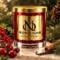 Red MAISON NOOR candle with gold lid framed by cranberries, currants, cinnamon, vanilla and evergreen sprigs.