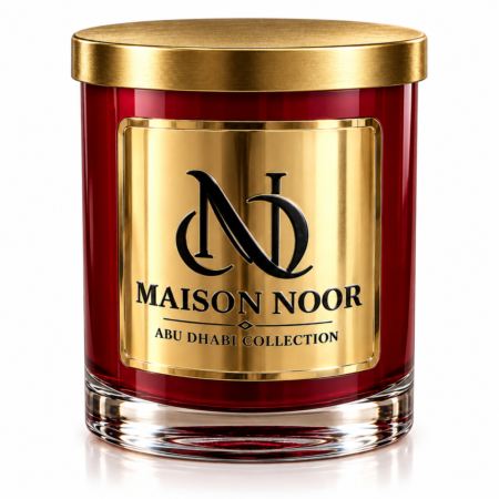 MAISON NOOR luxury candle in a red glass vessel with a gold metal lid and signature gold plaque on a white background