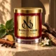 MAISON NOOR Patchouli candle with patchouli leaves, ginger, cinnamon, cloves, jasmine and wood on warm ivory limestone.