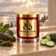 MAISON NOOR Petrichor candle on rain-damp limestone with cucumber slices, moss, dark stone and patchouli leaves overlooking a hazy horizon.